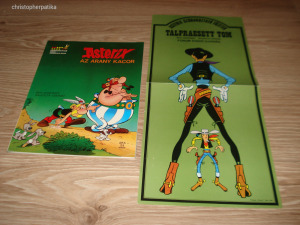 Eladó 1 db Asterix AZ/2 Az arany kacor képregény saját eredeti plakátjával együtt Talpraesett Tom