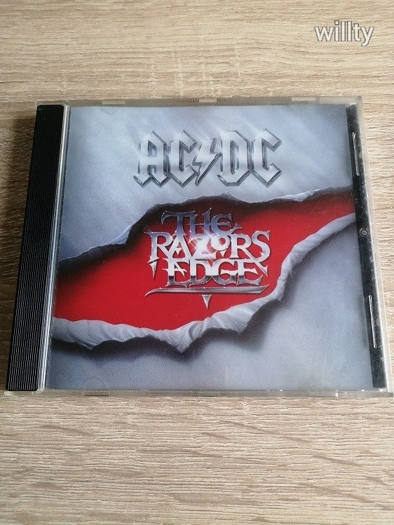 AC/DC - The Razors Edge (1990) MEGKÍMÉT KORAI ATCO RECORDS KIADÁSÚ CD!